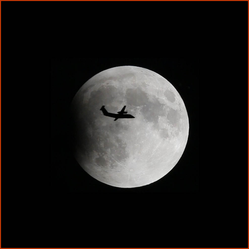 Moon Eclipse and Airplane